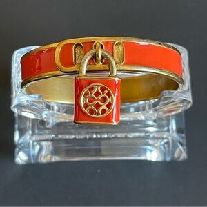 Coach Enamel bangle with Lock Charm.